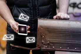 Man at Mailbox with phone